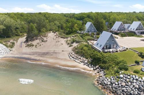 an aerial view of a house on a beach at Chalet #17 in Stevensville