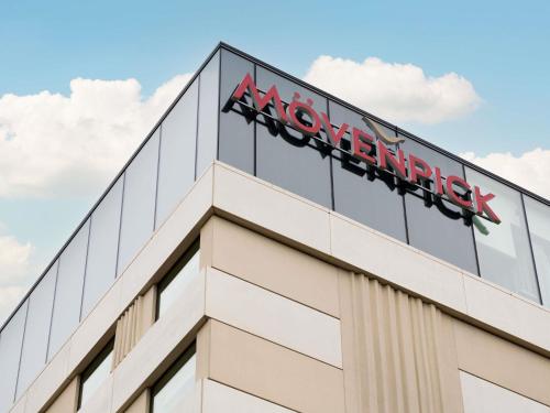a sign on top of a novotel building at Mövenpick Hotel Brussels Airport in Zaventem