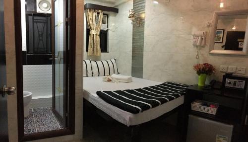 Postel nebo postele na pokoji v ubytování Skyview Hostel
