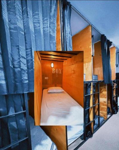 a small room with a bunk bed in it at ak Hostel selayar in Benteng