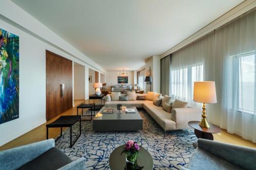a living room with a couch and a table at Hyatt Regency Trinidad in Port-of-Spain