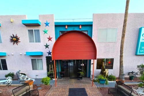 a building with an archway in front of it at Sands Inn & Suites Lake Havasu City in Lake Havasu City