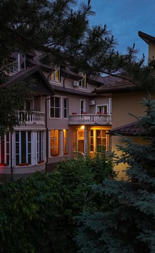 a large house with its lights on at Villa Venus in Deva