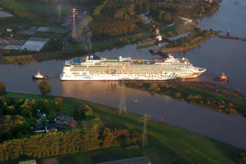an overhead view of a cruise ship in a river at Landhaus Gut Halte in Papenburg