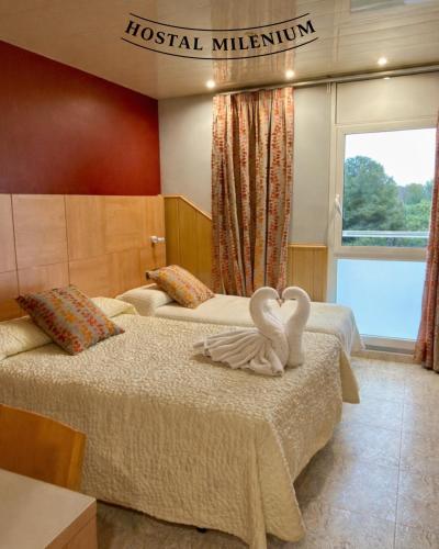 Katil atau katil-katil dalam bilik di Hostal Milenium