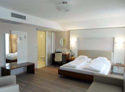 Postelja oz. postelje v sobi nastanitve Gokart Hotel