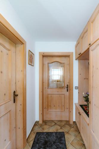 a room with a door and a window and a counter at Appartement Lackner TOP 2 - Weissensee in Weissensee