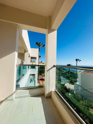 an empty balcony of a house with an aquarium at Saradari Beach Hotel - Adults Only in Hersonissos