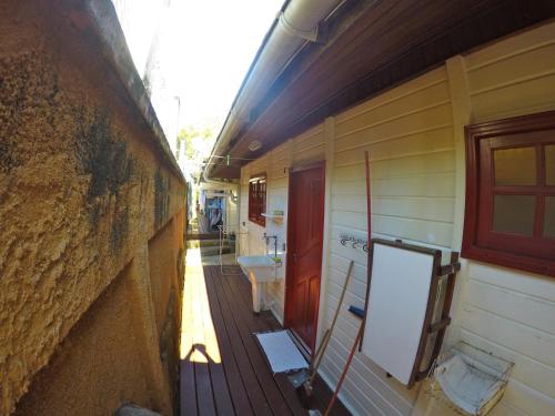 an outside view of a building with a sink at Condomínio Aldeia in Abraão