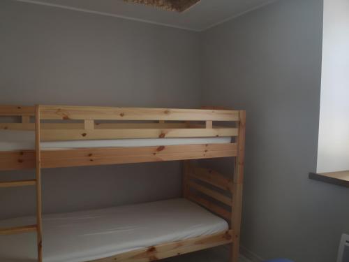 a couple of bunk beds in a room at Gite Chez Santou in Rocamadour