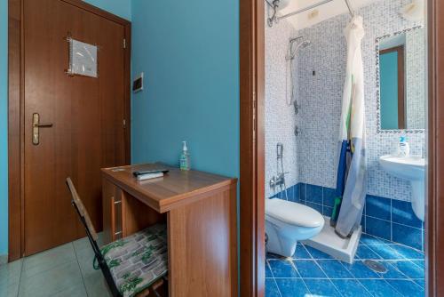 a bathroom with a toilet and a sink at Hotel Beauty Palace - Vertex Group in Rome