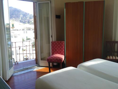 En eller flere senge i et værelse på Albergo Bandoni