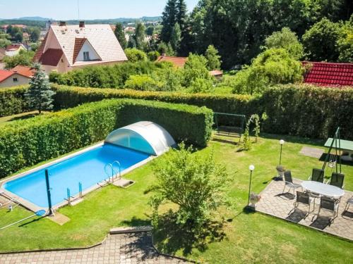 an aerial view of a backyard with a swimming pool at Villa Forestside Villa by Interhome in Planá nad Lužnicí