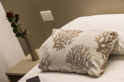 Postel nebo postele na pokoji v ubytování Malucri Resort