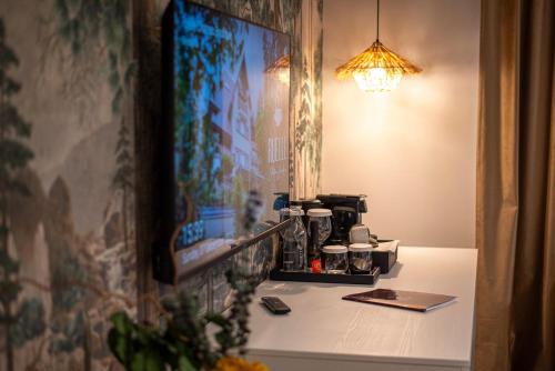 a room with a counter with a coffee maker on it at RUELLE Chateau Boutique- adults only in Sinaia