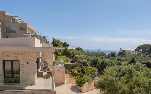 a view of the house from the balcony at Villa Mimoza Apelati in Keri