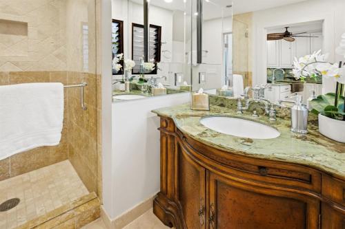 a bathroom with a sink and a shower at 622 Kapalua Ridge Villa in Lahaina