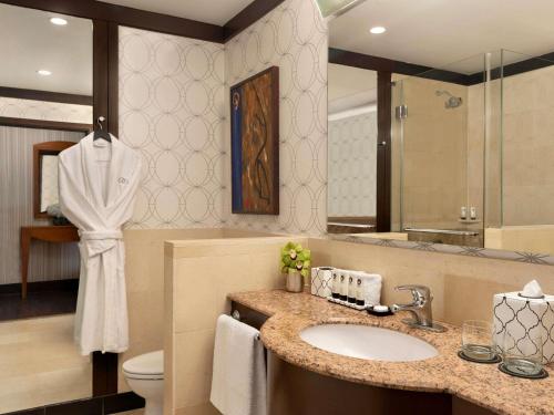 a bathroom with a sink and a toilet at Sofitel Philadelphia at Rittenhouse Square in Philadelphia