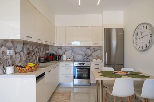 Homey Comfort and Elegance at Olive Grove!