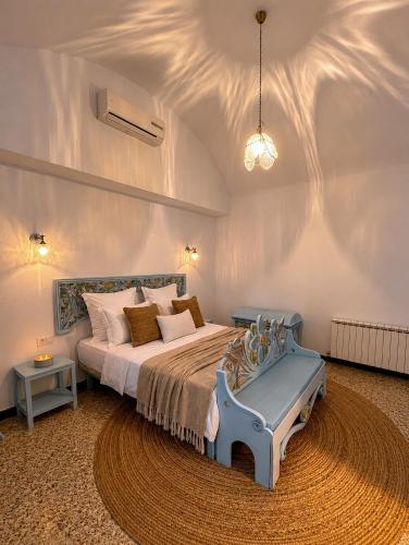 a bedroom with a large bed in a room at Casa Giallo Kelibia - Traditional charm in Kelibia