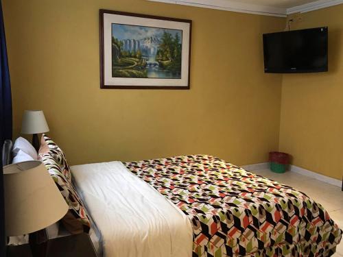 TV a/nebo společenská místnost v ubytování La Gran Fortaleza B&B