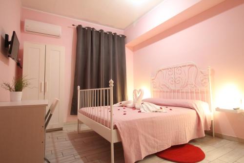 Postel nebo postele na pokoji v ubytování Nemi rooms