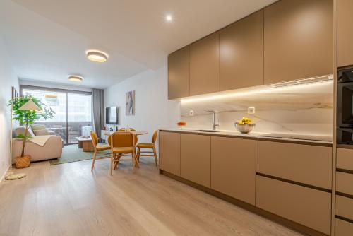 Premium Living with Pool, Balcony, Gym & Garage by HostWise