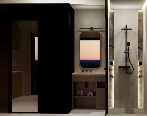 a bathroom with a sink and a mirror at Nerion Hotel & Spa in Agia Marina Nea Kydonias