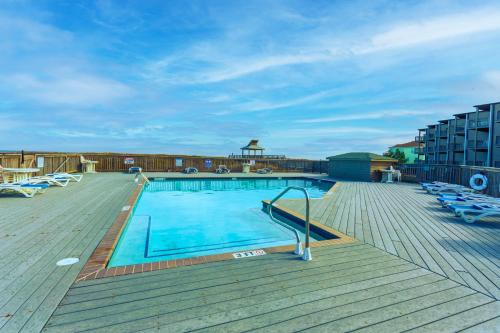 a large swimming pool on top of a building at C308B - Duck Tails in Duck