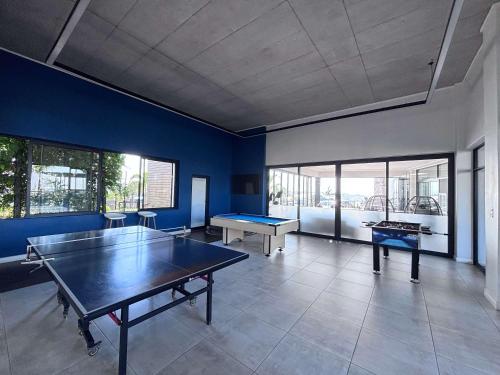 a ping pong room with a ping pong table at Ocean Sunrise! in Ballito