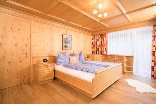 Tempat tidur dalam kamar di Hochmuthhof