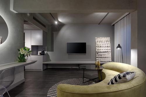 Телевизор и/или развлекательный центр в Caesar Business Belo Horizonte Belvedere