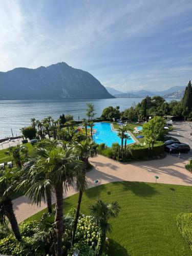 a view of the lake from a resort at Ticino Lakeview Apartment in Bissone
