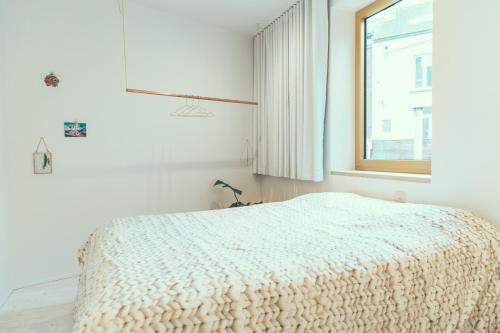 Postel nebo postele na pokoji v ubytování AP8 city & park apartement