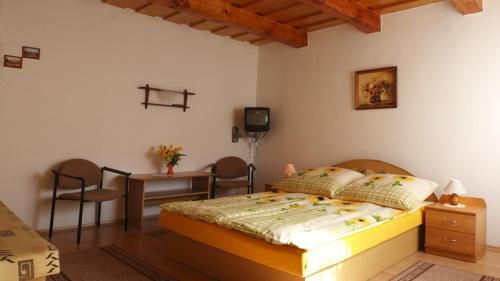 Posteľ alebo postele v izbe v ubytovaní Chalupa Evka