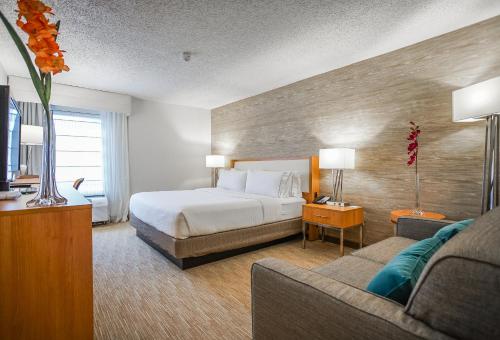 Voodi või voodid majutusasutuse Sleep Inn & Suites toas