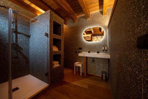 a bathroom with a shower and a sink at Hosteria Pastor in Aranda de Duero