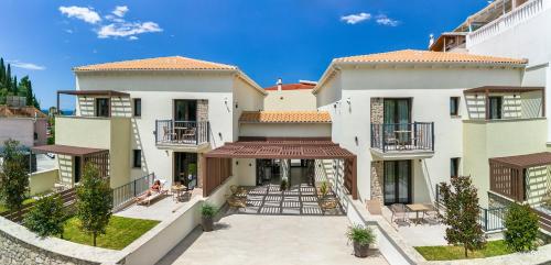 an exterior view of a house with a patio at Parga Gem K in Parga