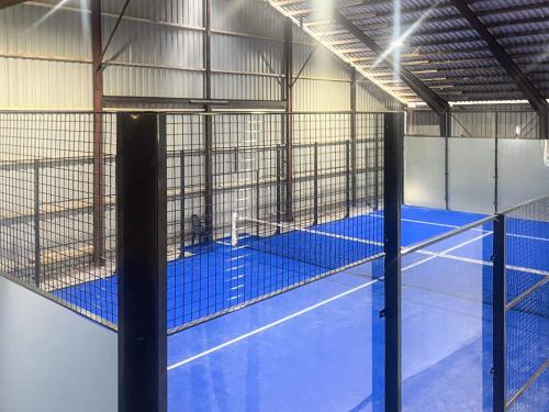 a room with a tennis court inside of a building at 4 star holiday home in Svendborg in Svendborg
