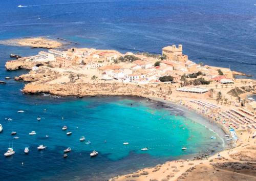 an aerial view of a beach with boats in the water at CASA CALMA Isla Tabarca - Alicante in Tabarca
