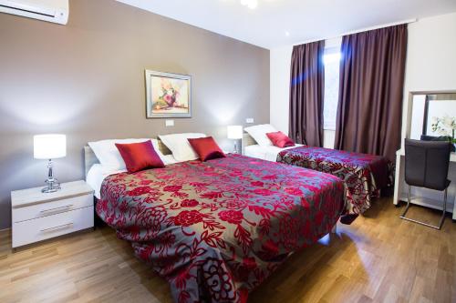מיטה או מיטות בחדר ב-Villa Seven Lakes