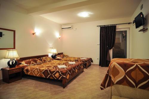 Ένα ή περισσότερα κρεβάτια σε δωμάτιο στο Apartments Samardžić