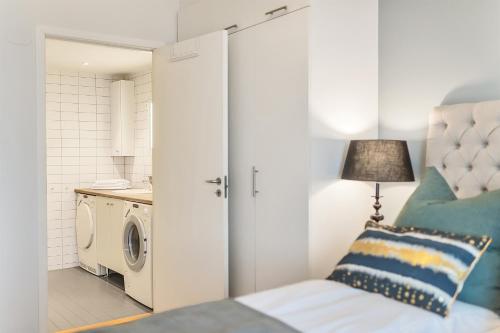 Katil atau katil-katil dalam bilik di Wright Apartments - Sørenga