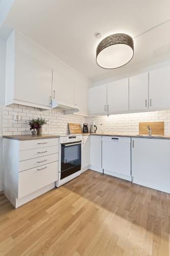 Dapur atau dapur kecil di Wright Apartments - Sørenga