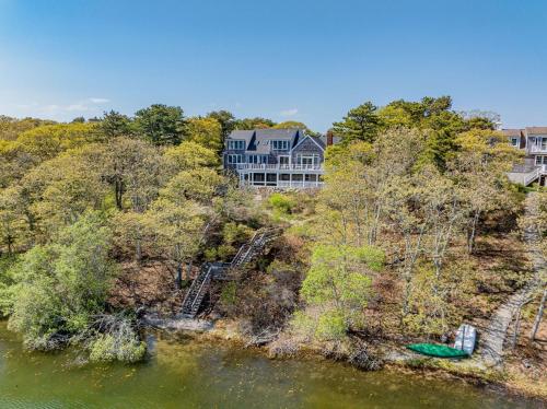 an aerial view of a house and a lake at Lake front, Near Beach, AC, WiFi, Pet Friendly near Bike Path in Chatham