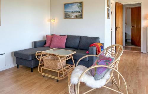 a living room with a couch and chairs and a table at Nice Home In Børkop With Wifi in Børkop