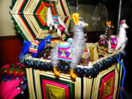 a group of stuffed animals sitting on top of a carousel at Huaytusive Inn Hotel in Puno