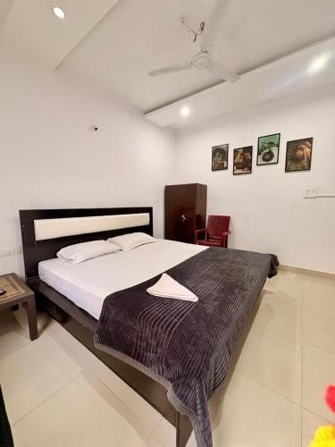 a bedroom with a large bed in a room at The capital hotel in Visakhapatnam