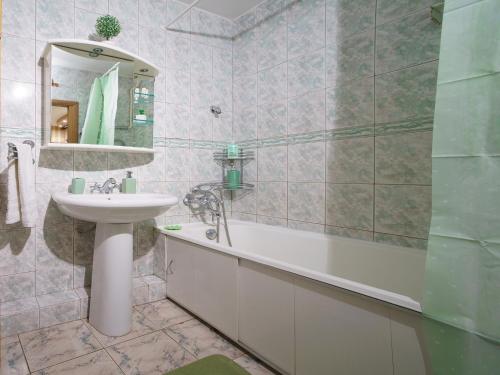 Ванная комната в PaulMarie Apartments on Naberezhnaya