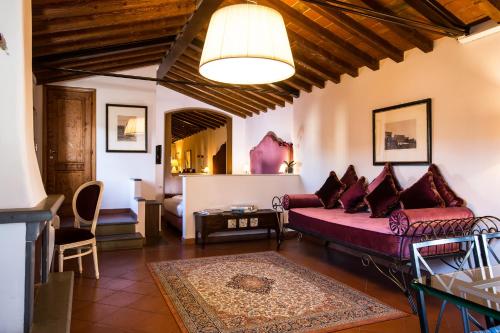 Posteľ alebo postele v izbe v ubytovaní Hotel Burchianti